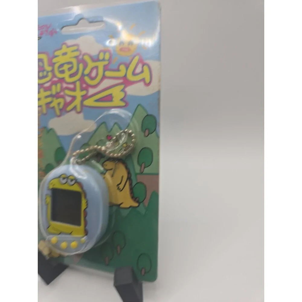 Retro Dinosaur game Gao! Tamagotchi style virtual pet - Sealed - CIB 1996/1997